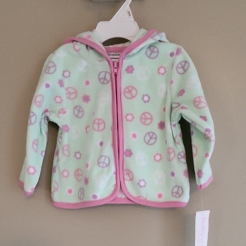 NWT very soft fleece zip up hoodie with peace sign/flower print